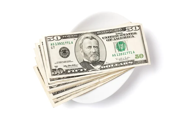 Pagando por dinheiro em prato — Fotografia de Stock