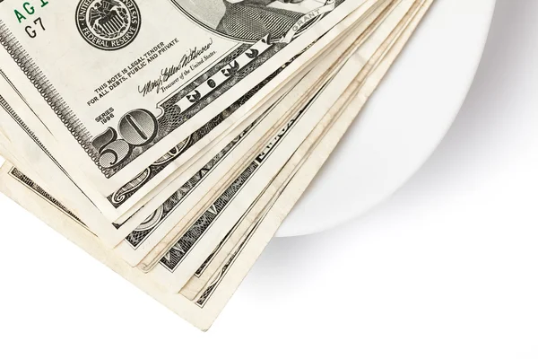Pagar con dinero en el plato —  Fotos de Stock