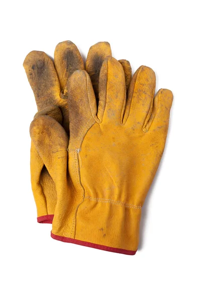 Используемые кожаные перчатки — стоковое фото