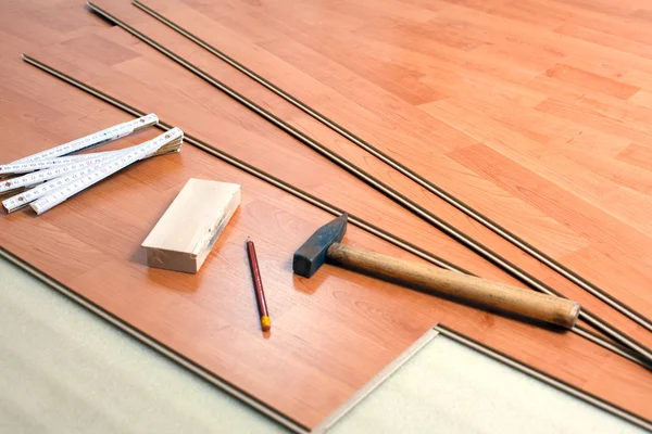 Stock image Wood flooring and tools