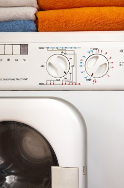 Washing machine and towels clipart