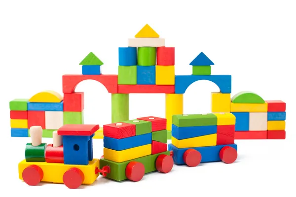 Красочные игрушечные поезда и игрушечные блоки — стоковое фото