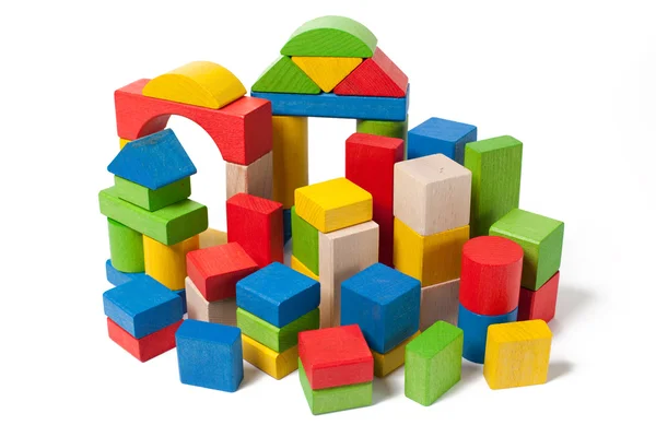 Cidade de blocos de brinquedos de madeira coloridos — Fotografia de Stock