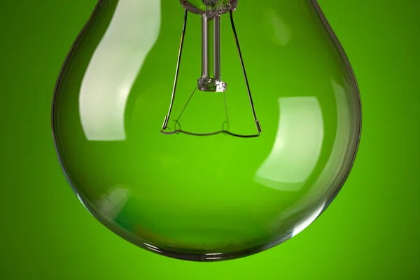 Détail de l'ampoule sur fond vert — Photo