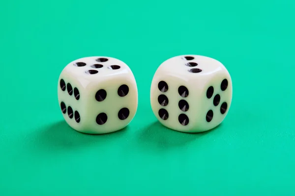Dice on green background — Stock Photo, Image