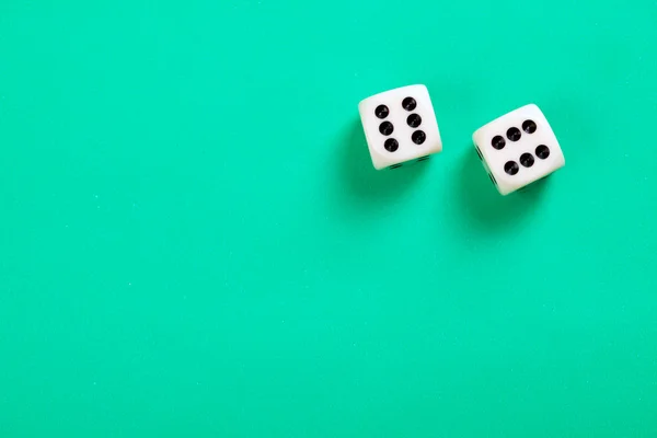 Dice on green background — Stock Photo, Image