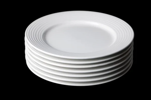 White plate on black background — Stock Photo, Image