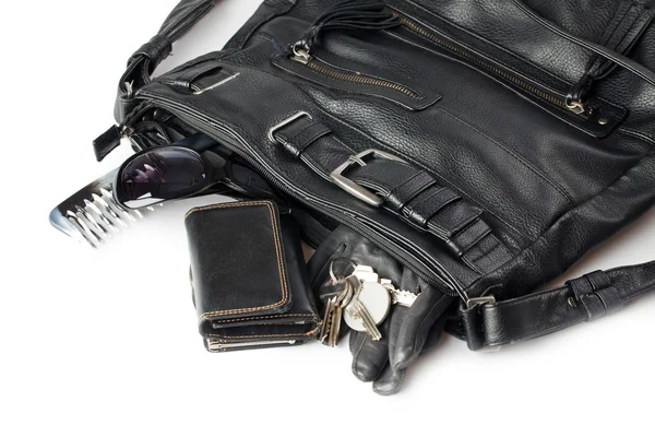 Woman handbag with accesories — Stock Photo, Image