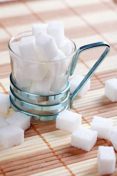 Cubo de açúcar no copo — Fotografia de Stock