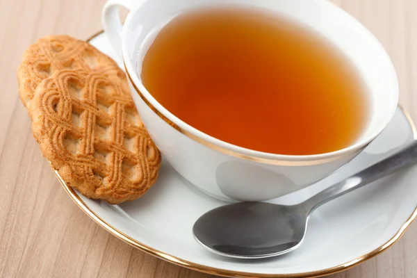Солодке печиво і чай — стокове фото