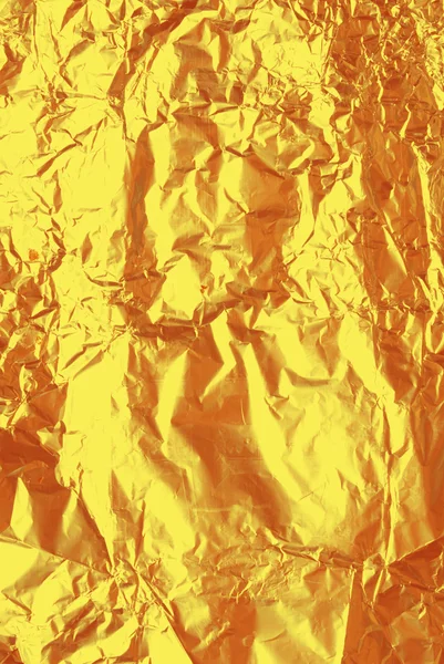 Textur aus goldener Folie — Stockfoto