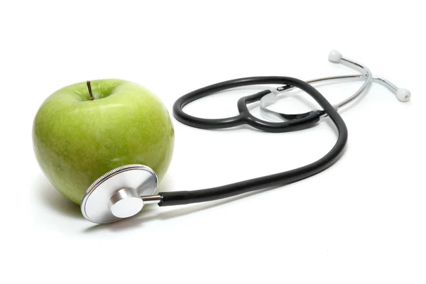 Stethoskop und Apfel — Stockfoto