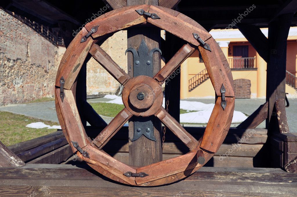 Ancient wooden wheel — Stock Photo #2544967