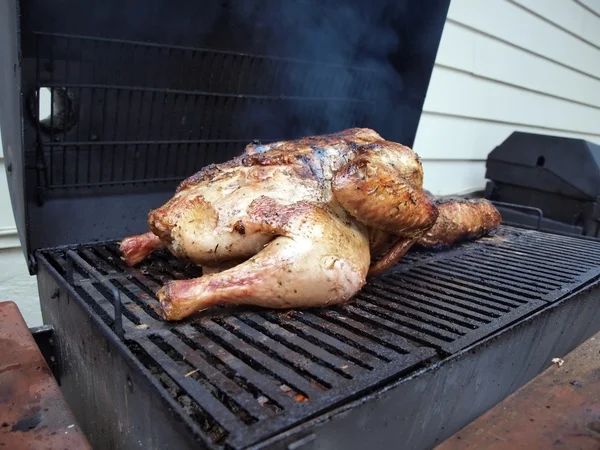 Turkey on smoker grill — Stock Photo, Image