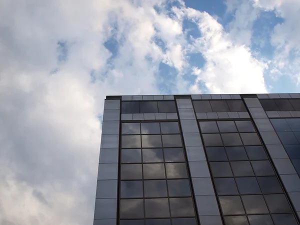 stock image Building and cloudy blue sky