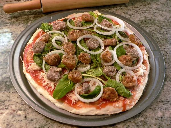 Fresh pizza unbaked — Stock Photo, Image