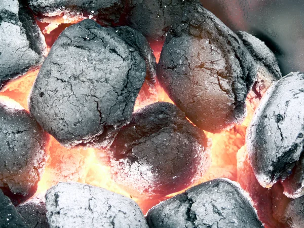 Charcoal - smoldering in flames — Stock Photo, Image