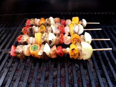 Shish kebabs on the grill clipart