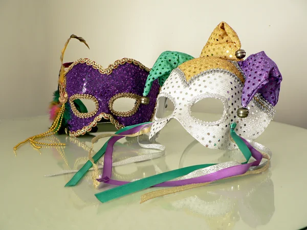 Карнавальные маски на стекле 3 — стоковое фото