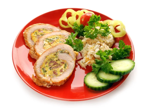 Stuffed turkey meat on red plate — Stock Photo, Image