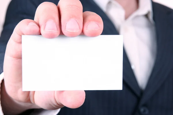 stock image Holding a business card