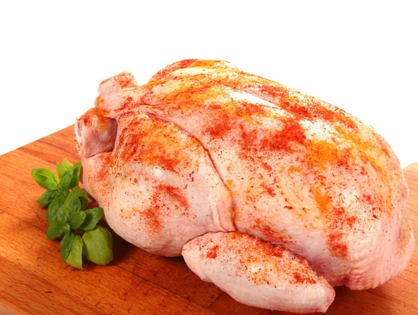 Fresh frozen chicken with spice — Stock Photo, Image