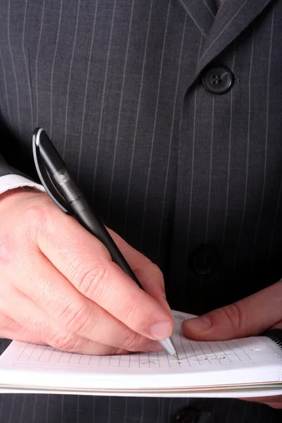 Επιχειρηματίας χέρι κάνοντας σημειώσεις — Φωτογραφία Αρχείου