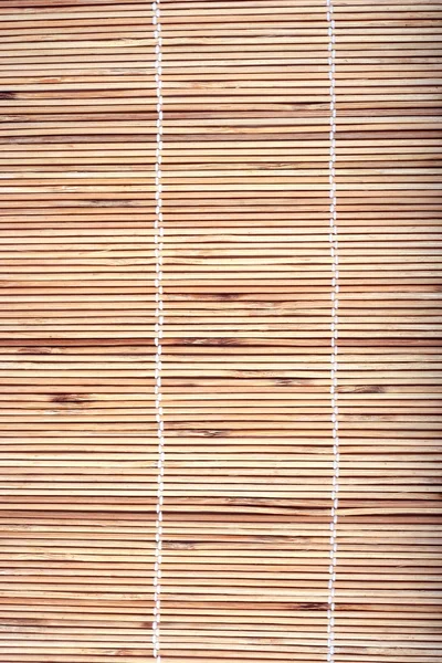 Деревянный бамбуковый коврик — стоковое фото