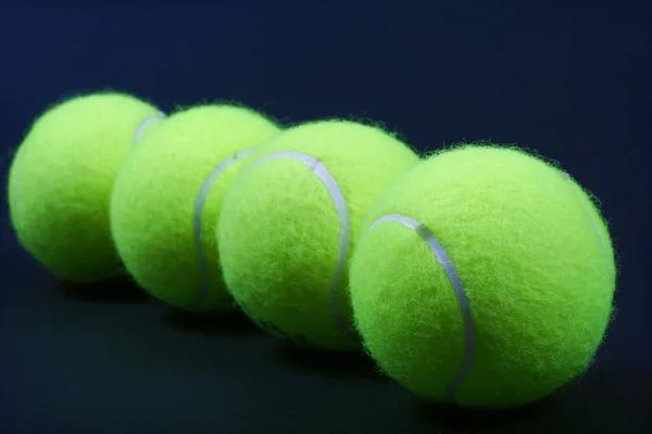 Quatre balles de tennis — Photo