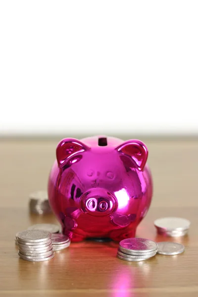 Piggy bank with silver coins