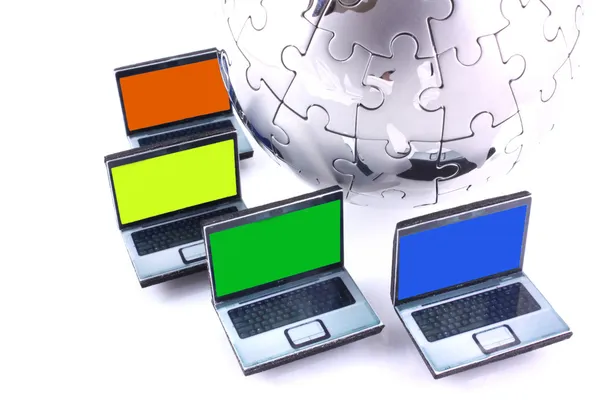 Stock image Laptops around a chrome globe