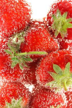 Strawberries being washed clipart