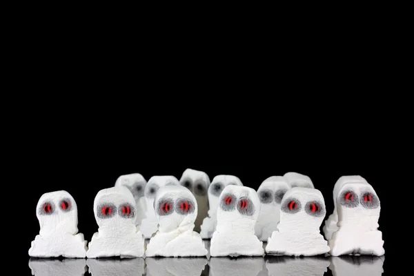 Evil white ghosts in a crowd — Stock Photo, Image