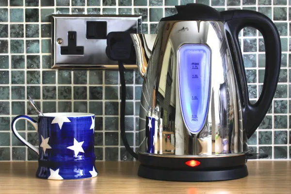 Electric kettle and cup — Stock Photo, Image