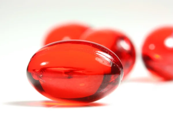 Red capsule pill — Stock Photo, Image