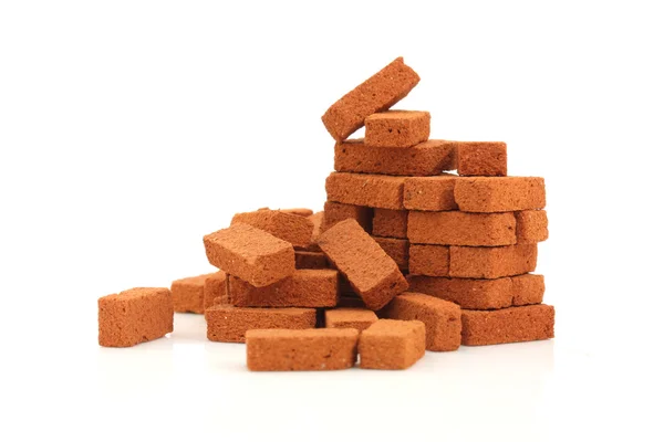 Big pile of bricks isolated Stock Picture