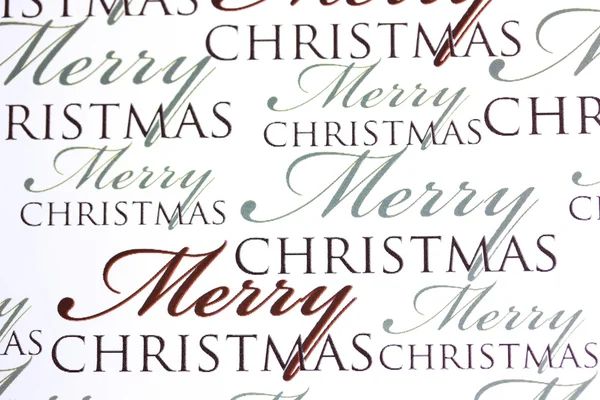 Merry Christmas words on paper backgroun — Stock Photo, Image