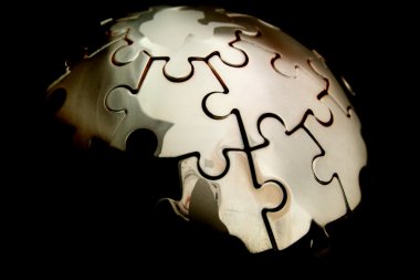 Earth jigsaw on black background clipart