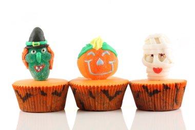 Spooks cup cakes on white background clipart