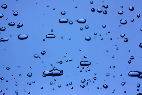 Burbujas sobre fondo azul —  Fotos de Stock