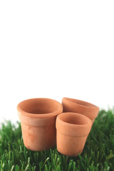 Pots on grass with copy space — Stock Photo, Image