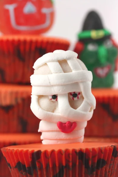 Mummy sweet on cup cake — Stock Photo, Image