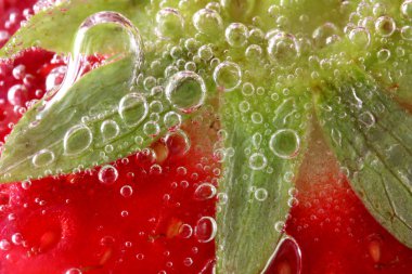 Strawberries in water macro clipart