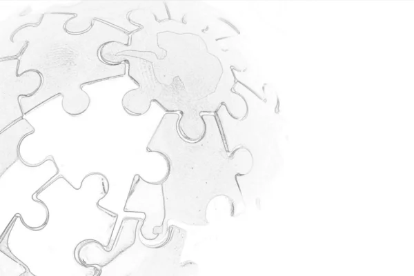 Over blootgesteld puzzel witte logo — Stockfoto