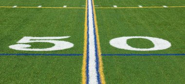 At the 50 yard line on a football field clipart