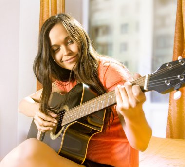 Woman with guitar clipart