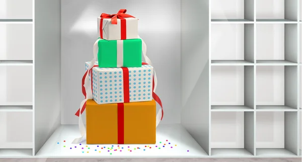 Christmas boxes in the shelf — Stock Photo, Image