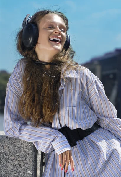 Face of girl with head-phones — Stock Photo, Image