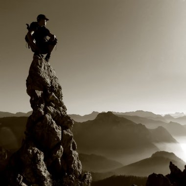 Mountain scenery - man on a rock top