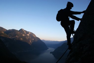 Silhouette of a climber clipart